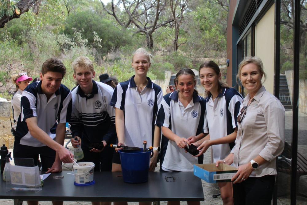 Bushland Carers Students seed cleaning in Bold Park.