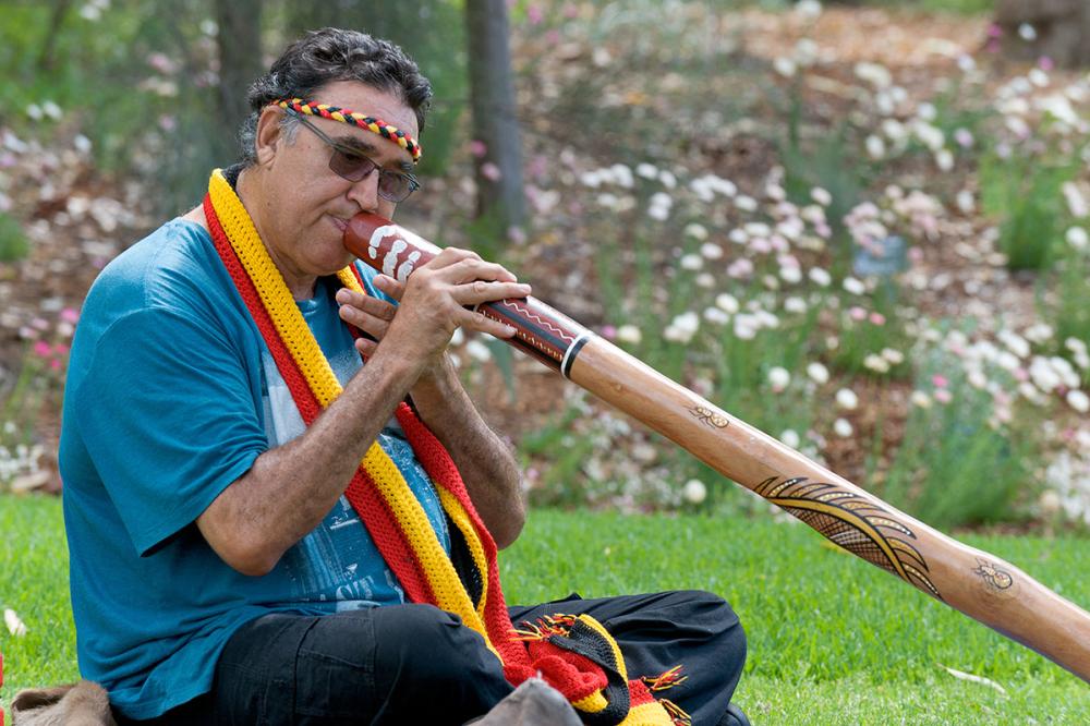 Kings Park has a rich Noongar history. Wadumbah Aboriginal Dance Group's James Webb playing a didgeridoo.