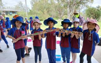 Students do tree wrap activity as part of Noongar Boodja's 2024 Birak Festival